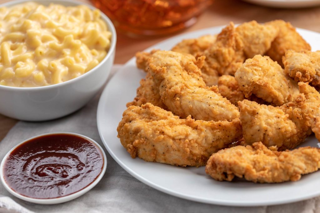 Slim Chickens tenders, mac and cheese and sauces